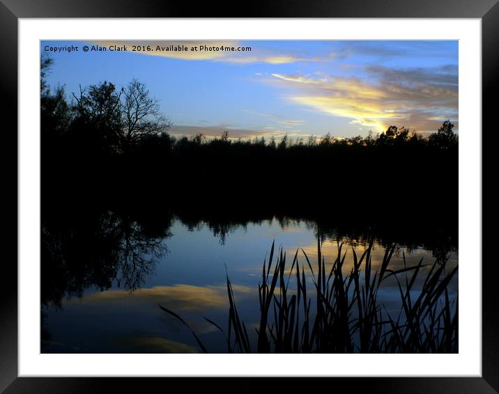 Sunset over the lake. Framed Mounted Print by Alan Clark