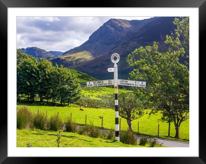 Buttermere road sign in english lake district Framed Mounted Print by Steve Heap