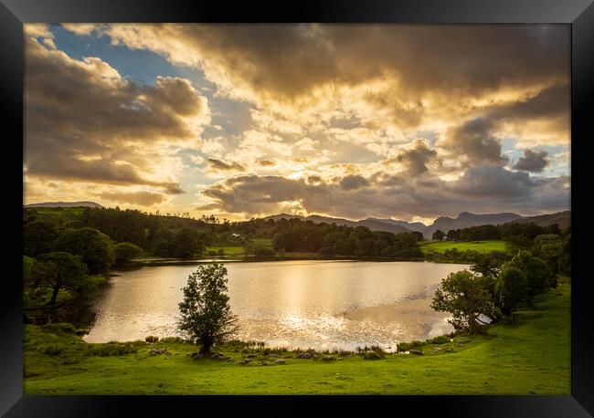 Sunset at Loughrigg Tarn in Lake District Framed Print by Steve Heap