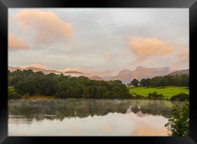 Sunrise at Loughrigg Tarn in Lake District Framed Print by Steve Heap