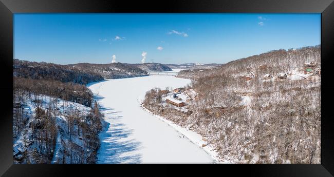 Aerial view down the frozen Cheat River in Morgantown, WV Framed Print by Steve Heap