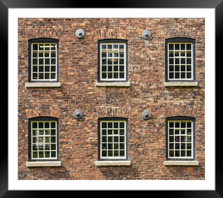 Restored industrial cotton mill with pattern of wi Framed Mounted Print by Steve Heap