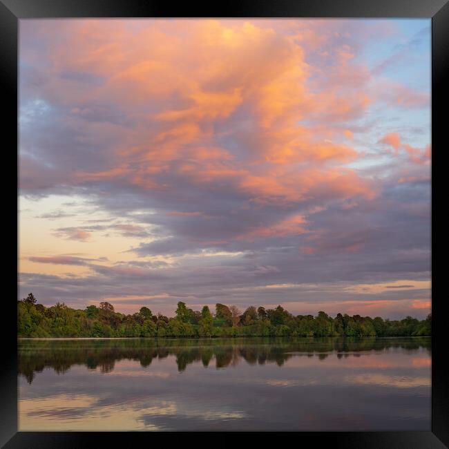 View across the Ellesmere Mere to a clear reflection of distant  Framed Print by Steve Heap
