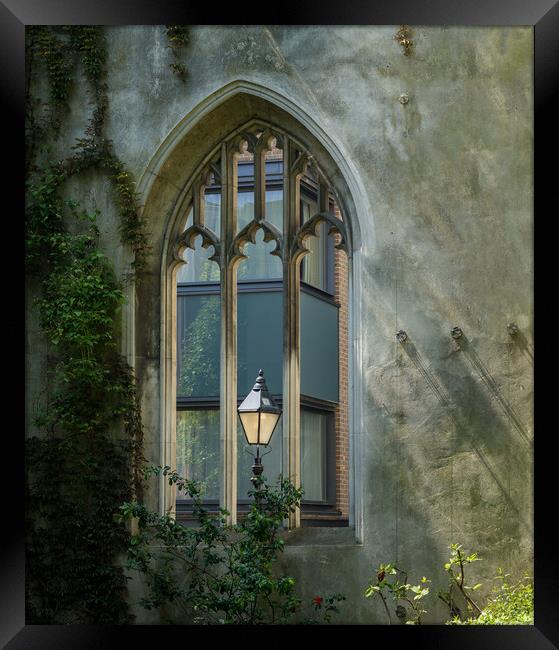 London street light seen through old windows of St Framed Print by Steve Heap