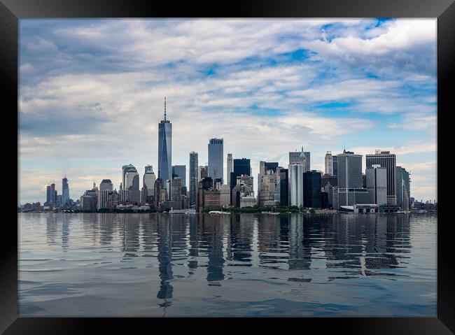 Panorama of Manhattan with calm artificial water Framed Print by Steve Heap