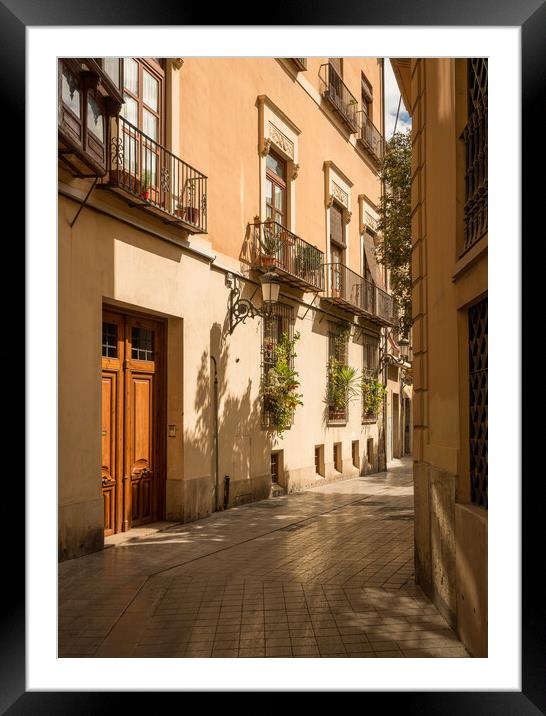 Narrow peaceful street in old town of Valencia Spain Framed Mounted Print by Steve Heap