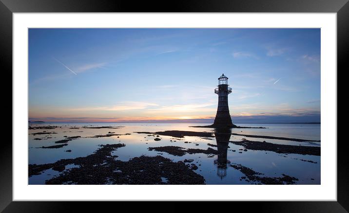 Lighthouse at sunset in silhouette, Framed Mounted Print by Jackie Davies