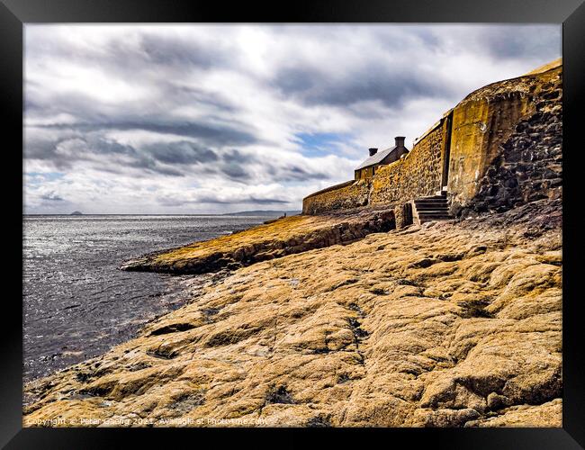 Saltcoast Harbour sea defence wall Framed Print by Peter Gaeng