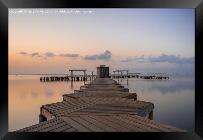 Jetty at Sunrise Framed Print by Gary Parker