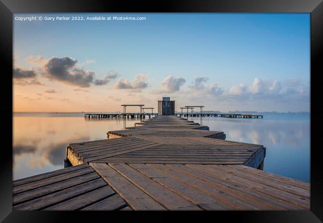 Sunrise over wooden jetty Framed Print by Gary Parker