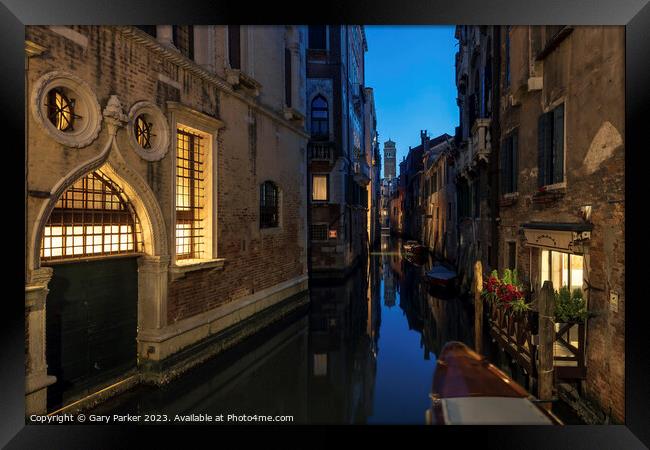 Venetian canal at night time Framed Print by Gary Parker