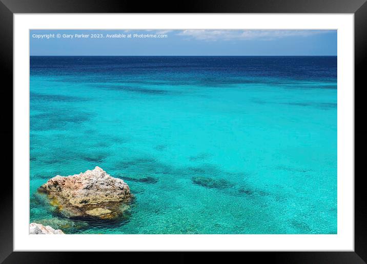 A tropical ocean, with a crystal clear, turquoise sea.  Framed Mounted Print by Gary Parker