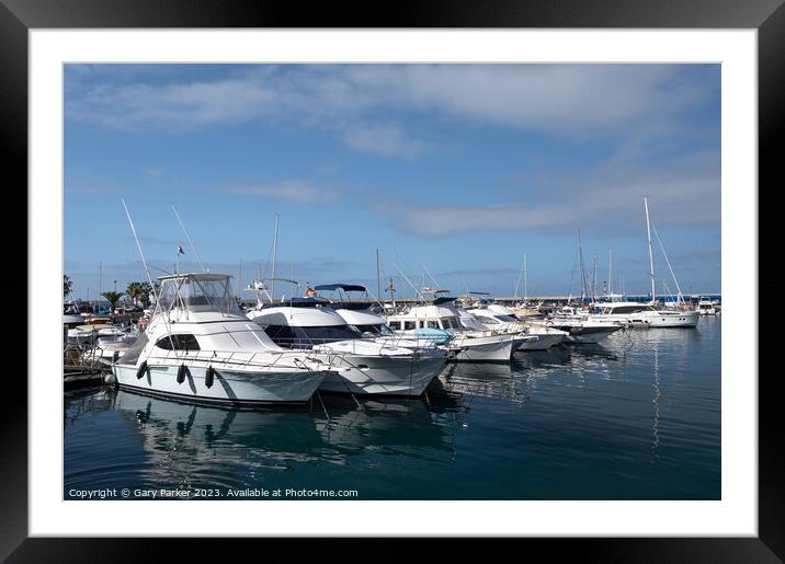 Boats and yachts in a harbour in Tenerife Framed Mounted Print by Gary Parker