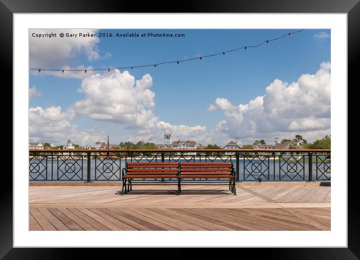 Single public bench on a boardwalk Framed Mounted Print by Gary Parker