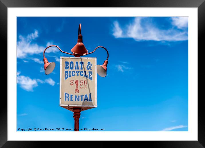 Boat and bikes for rent Framed Mounted Print by Gary Parker