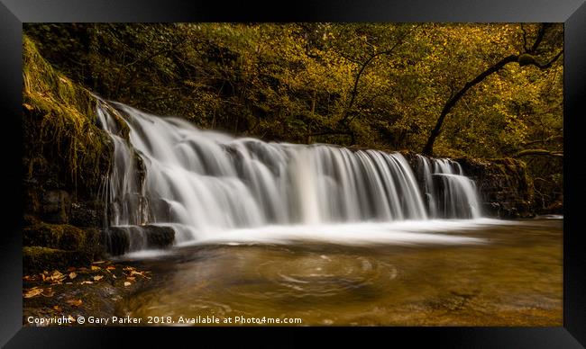 Waterfall with smooth water in the autumn Framed Print by Gary Parker