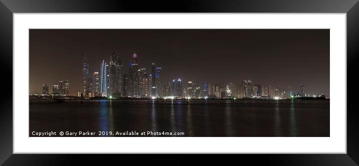 Skyscrapers of Dubai Marina at night.  Framed Mounted Print by Gary Parker