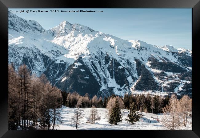 A view of the mountains in the French Alps.  Framed Print by Gary Parker