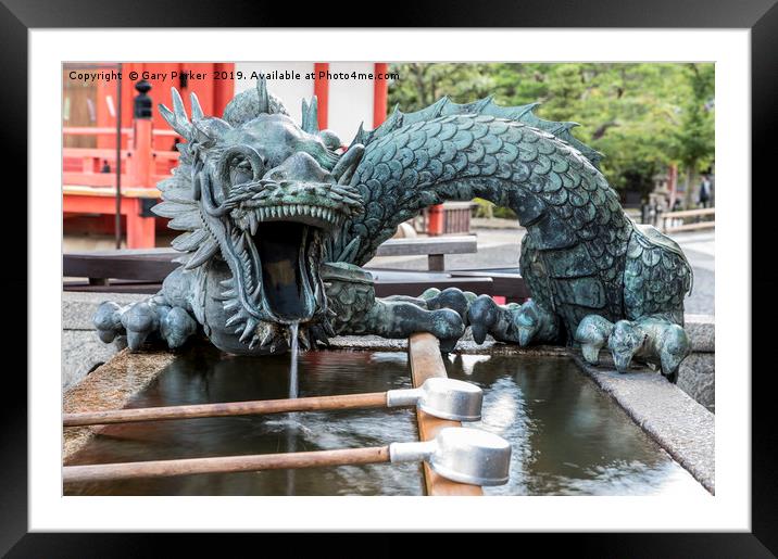Dragon water fountain at a Japanese temple Framed Mounted Print by Gary Parker