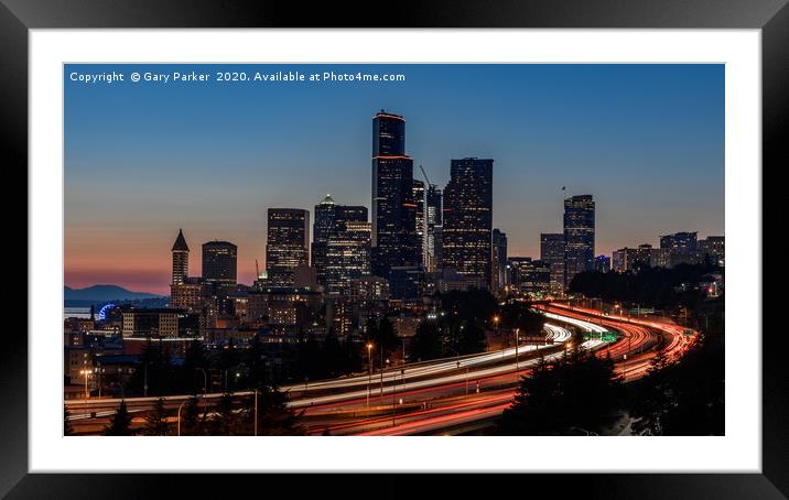 Seattle skyline, at sunset.  Framed Mounted Print by Gary Parker