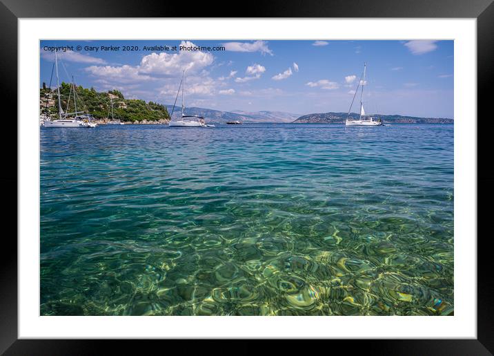 The clear waters of Kalami Bay, in Corfu, Greece, on a bright summers day	 Framed Mounted Print by Gary Parker