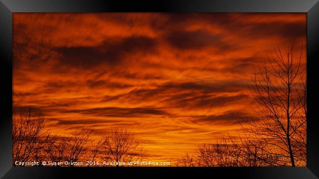 Sunset Over Cobus Framed Print by Susan Gratton