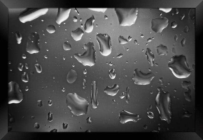 Raindrops Close-up on a Glass Window Framed Print by Rob Cole