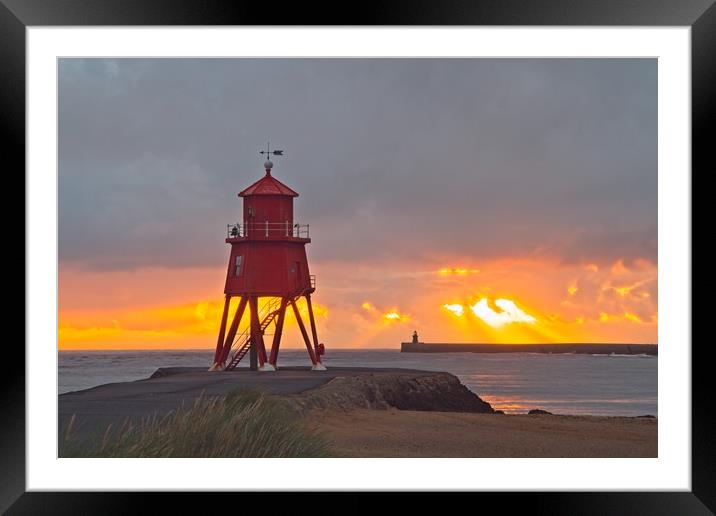 Radiant Sunrise over Red Herd Groyne Lighthouse Framed Mounted Print by Rob Cole