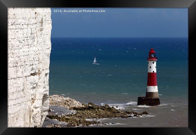 Beachy Head Lighthouse and sailing boat Framed Print by James Brunker