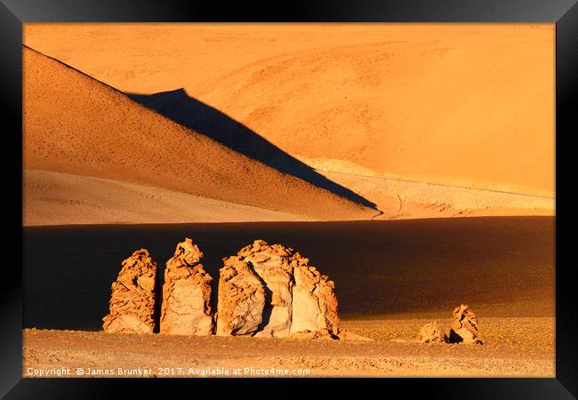 Moais de Tara at Sunrise Atacama Desert Chile Framed Print by James Brunker
