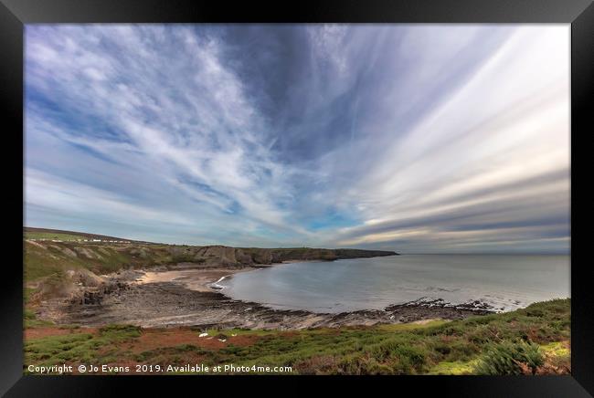 Clouds over Fall Bay, Gower Framed Print by Jo Evans