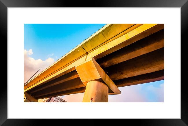 A bridge in perspective Framed Print by Rachid Karroo