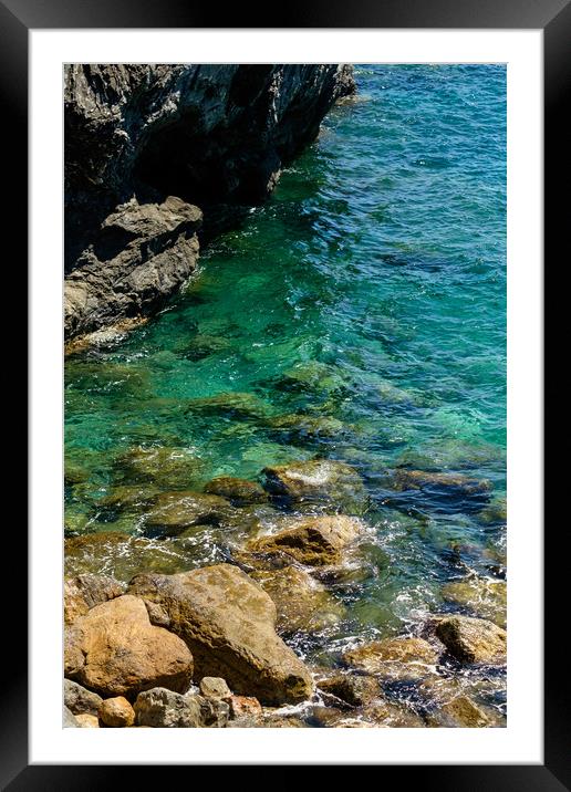 Stones in the sea Framed Mounted Print by Ranko Dokmanovic