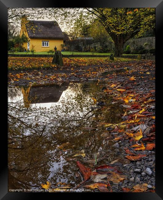 Yellow Thatched Cottage at Merthyr Mawr Framed Print by Neil Holman