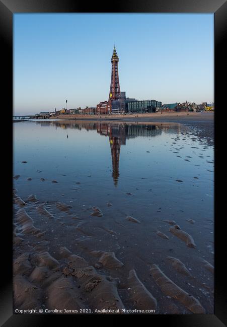 Tower Reflections Framed Print by Caroline James