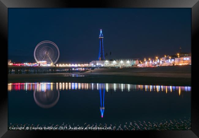 Reflective Tower Framed Print by Caroline James