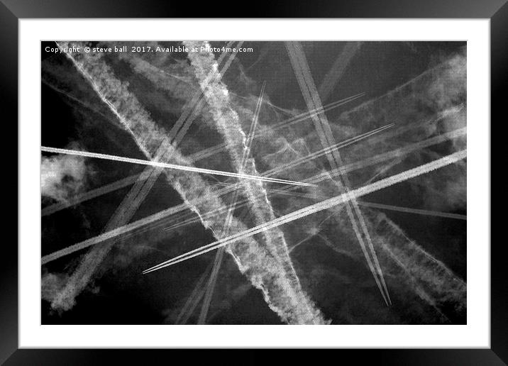Jet trails in a dark sky Framed Mounted Print by steve ball