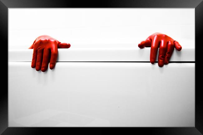 Red gloves Framed Print by Simon Thorpe