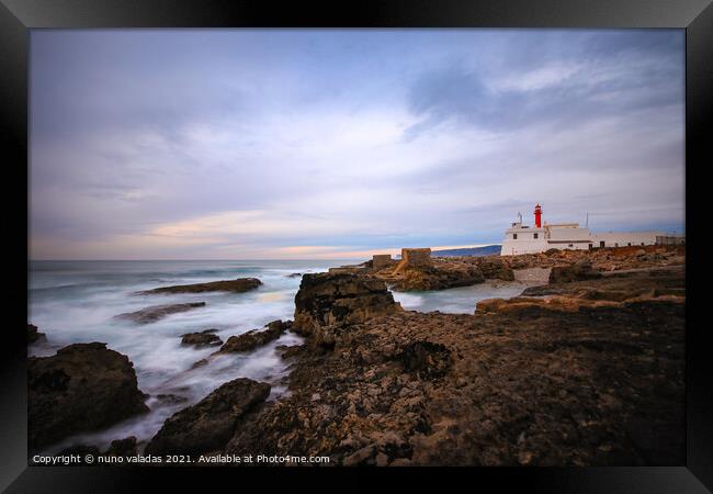Lighthouse with a amazing sky at the sunset. Framed Print by nuno valadas