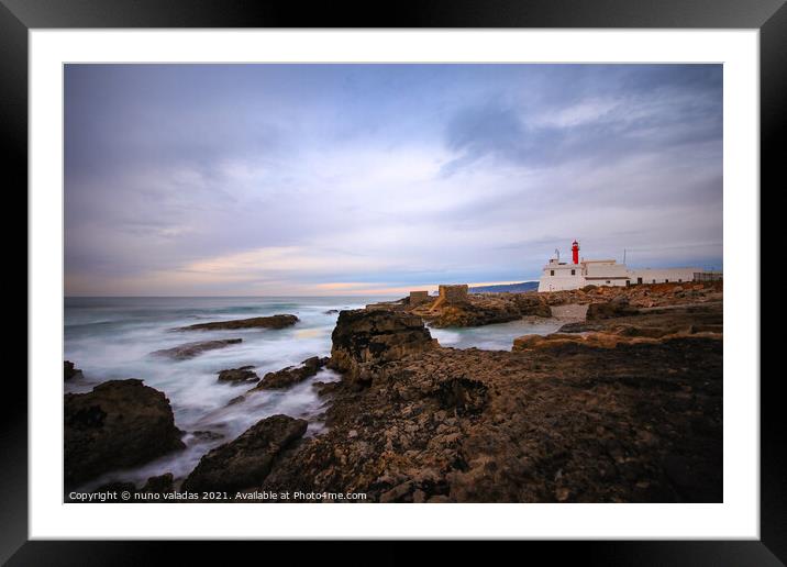 Lighthouse with a amazing sky at the sunset. Framed Mounted Print by nuno valadas