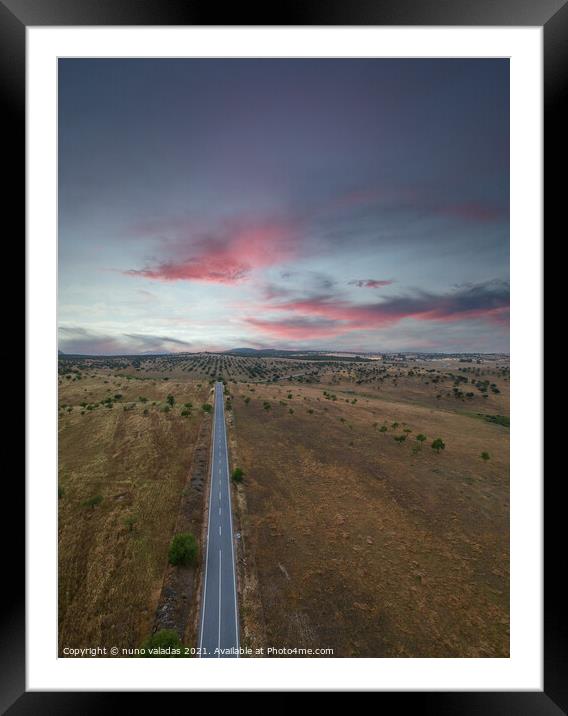 Aerial view of a country road in spring at the sunset Framed Mounted Print by nuno valadas