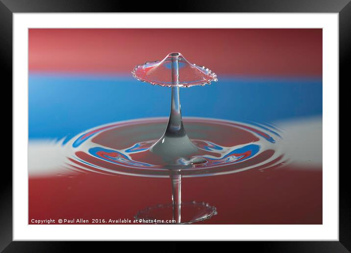 water drop collision in red white and blue Framed Mounted Print by Paul Allen