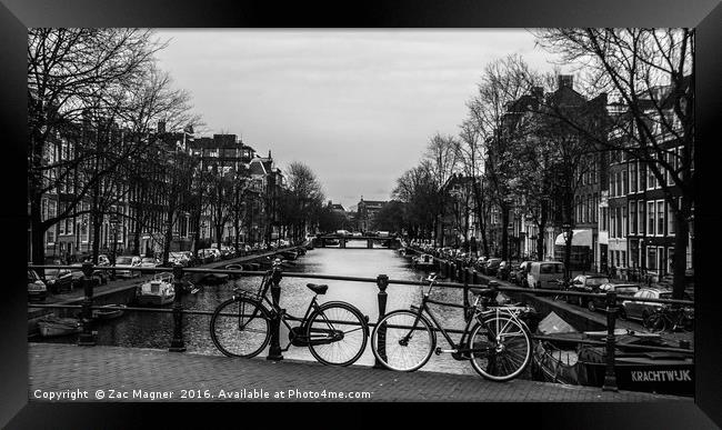 2 bicycles and a Canal Framed Print by Zac Magner