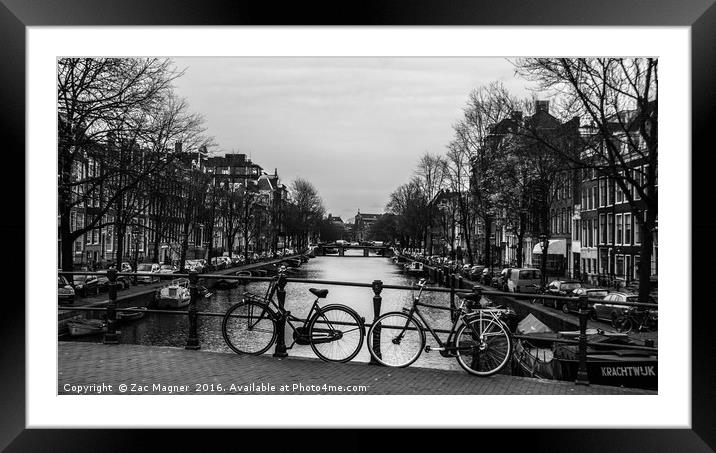 2 bicycles and a Canal Framed Mounted Print by Zac Magner