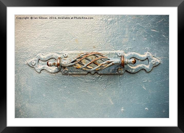 Blue metal handle Framed Mounted Print by Ian Gibson