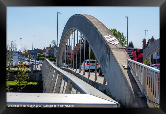 A modern steel road bridge over the river Aon Framed Print by Joy Walker