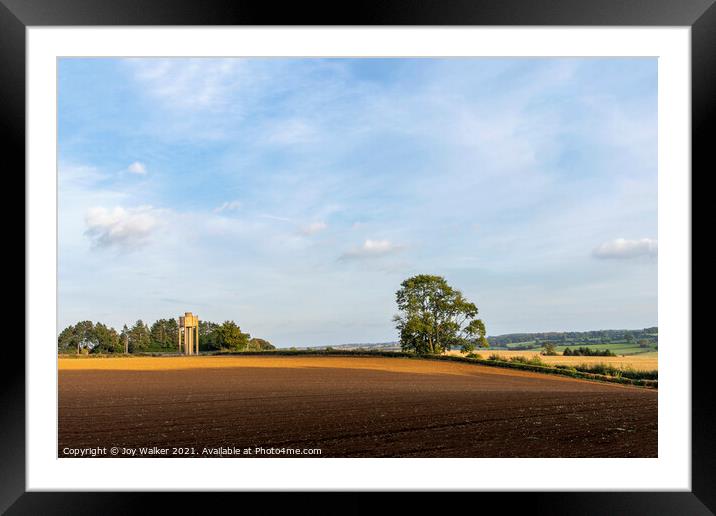 A Ploughed field in the Autumn sunshine Framed Mounted Print by Joy Walker