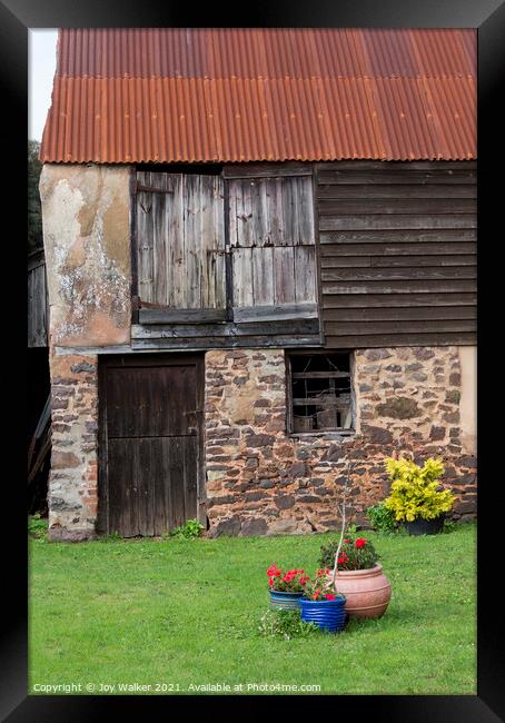 An old shed with flower pots Framed Print by Joy Walker