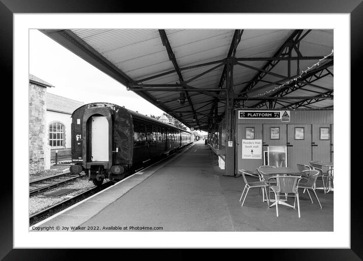 Minehead station, Somerset, UK with a  stationary train  Framed Mounted Print by Joy Walker