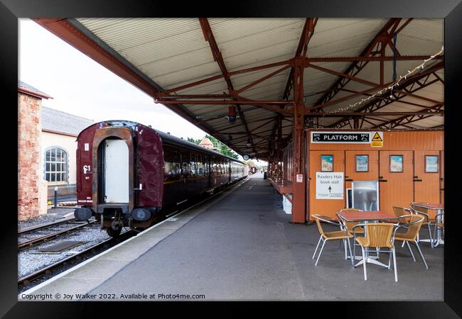 Minehead station, Somerset, UK with a stationary train  Framed Print by Joy Walker
